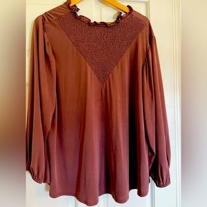 Maroon LuLaRoe flow fitting blouse.